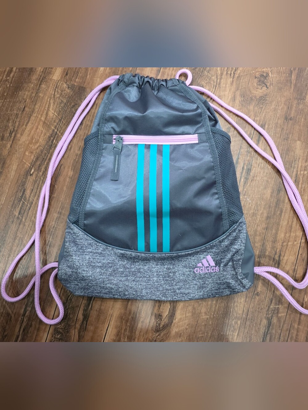 adidas Gray Drawstring Backpack with Teal Stripes and Pink Accents